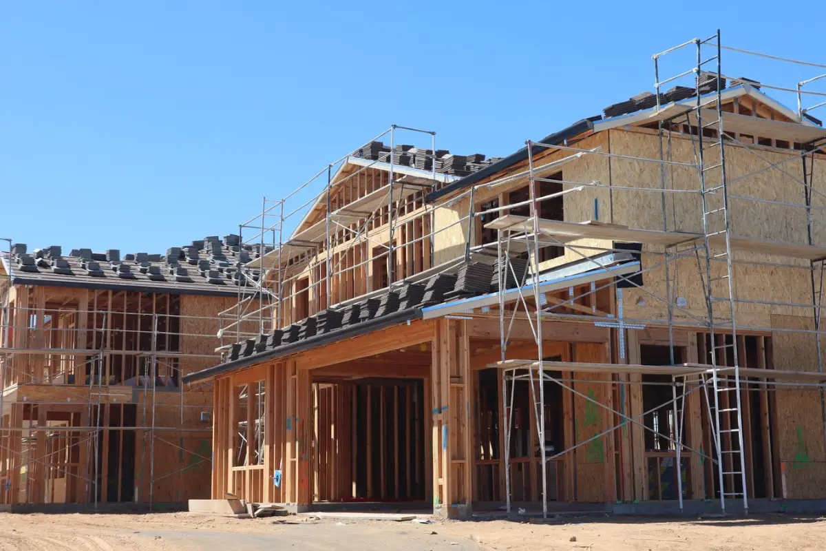 A house under construction with scaffolding